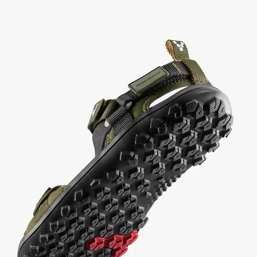 Vivobarefoot Tracker Ora – lengvos moteriškos barefoot basutės su plačia pirštų zona, lanksčiu sukibimą užtikrinančiu padu ir reguliuojamais dirželiais, sukurtos natūraliam judėjimui žygiuose bei kasdieniam dėvėjimui.
